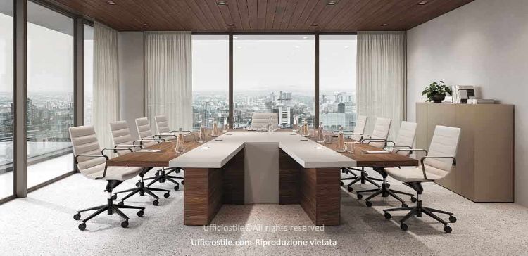 Tavolo conferenza Mux da 383 x 270 cm con piano in legno impiallacciato spessore 51 mm, struttura listellare con doppia anima in MDF e interno in abete, inserto tecnico in Fenix NTM spessore 52 mm con bordatura ABS e dettagli metallici verniciati a polveri epossidiche nero RAL 9005 goffrato.