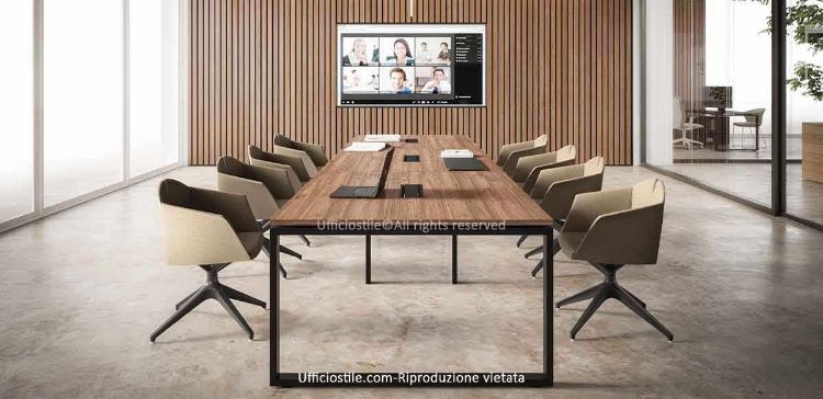Tavolo riunione da 360 x 122,5 cm con struttura ad anello in acciaio tubolare 70 x 30 mm verniciato a polveri epossidiche, piano spessore 25 mm in truciolare ecologico FSC® rivestito in melaminico antigraffio, tre top access con vasche portacavi integrate e finiture disponibili per piano bianco, rovere Portofino o noce Stelvio.