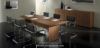Composizione per sala riunioni composta da tavolo rettangolare in melaminico con piano spessore 25 mm e libreria contenitore a sei ante, disponibile in diverse finiture e realizzata Made in Italy.