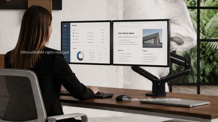 Tallo™ braccio monitor doppio Top Mount per postazioni multitasking, dotato di regolazione con molla a gas, slider VESA per l’allineamento laterale degli schermi, raggio di azione extra, finitura base nera e portata massima di 2 × 9 kg.