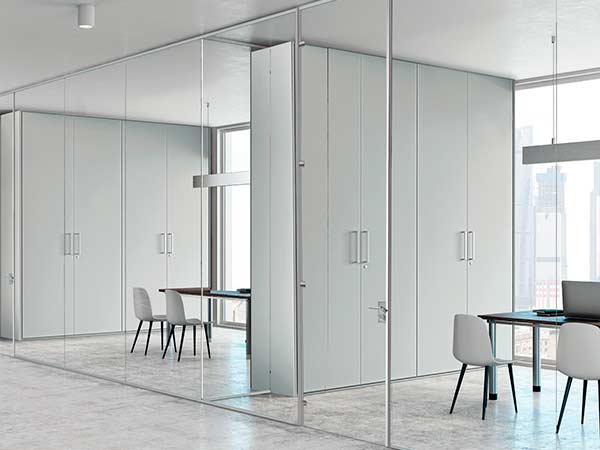 Fitted storage wall with flush doors and closed compartments