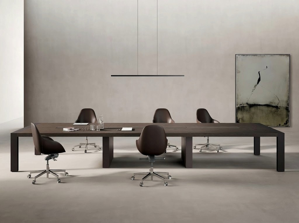 Dettaglio ergonomico di tavolo riunioni modulare con spigoli raggiati
