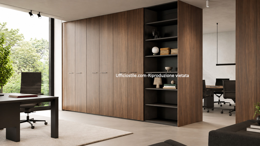 Full-height fitted storage wall with closed modules, niches and integrated storage
