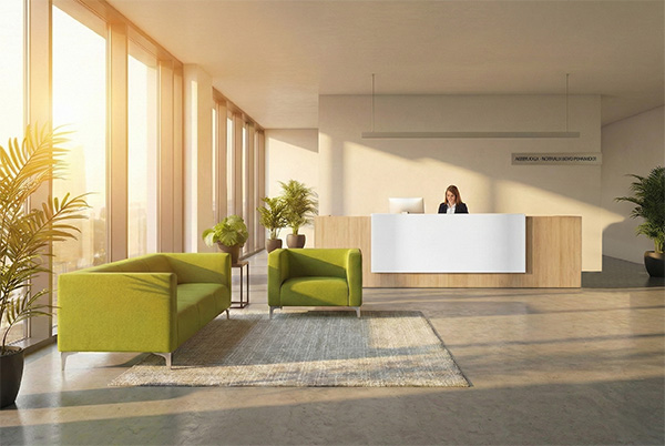 Area lounge con luce calda, colori armonici e pannelli fonoassorbenti