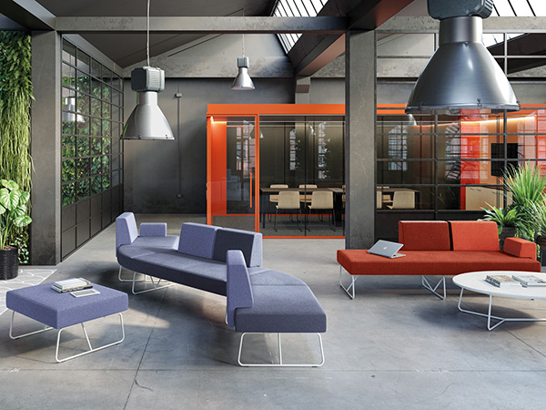 Area lounge confortevole per pause rigenerative in ufficio